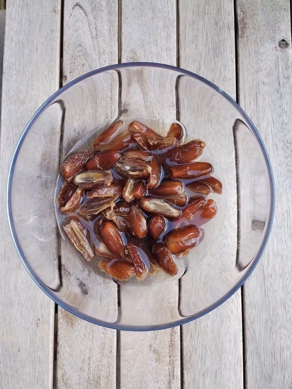 Soften dates in hot water